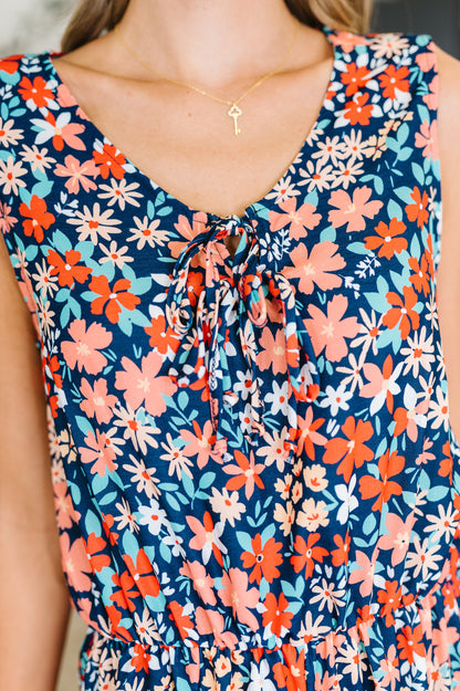 Meadow Mischief Sleeveless Romper in Navy/Orange/Teal